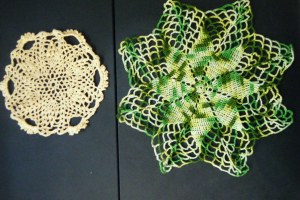 left:  Pattern from 50 Fabulous Pineapple Crochet Motifs.(*)  Right:  Copy of another antique  doily.  